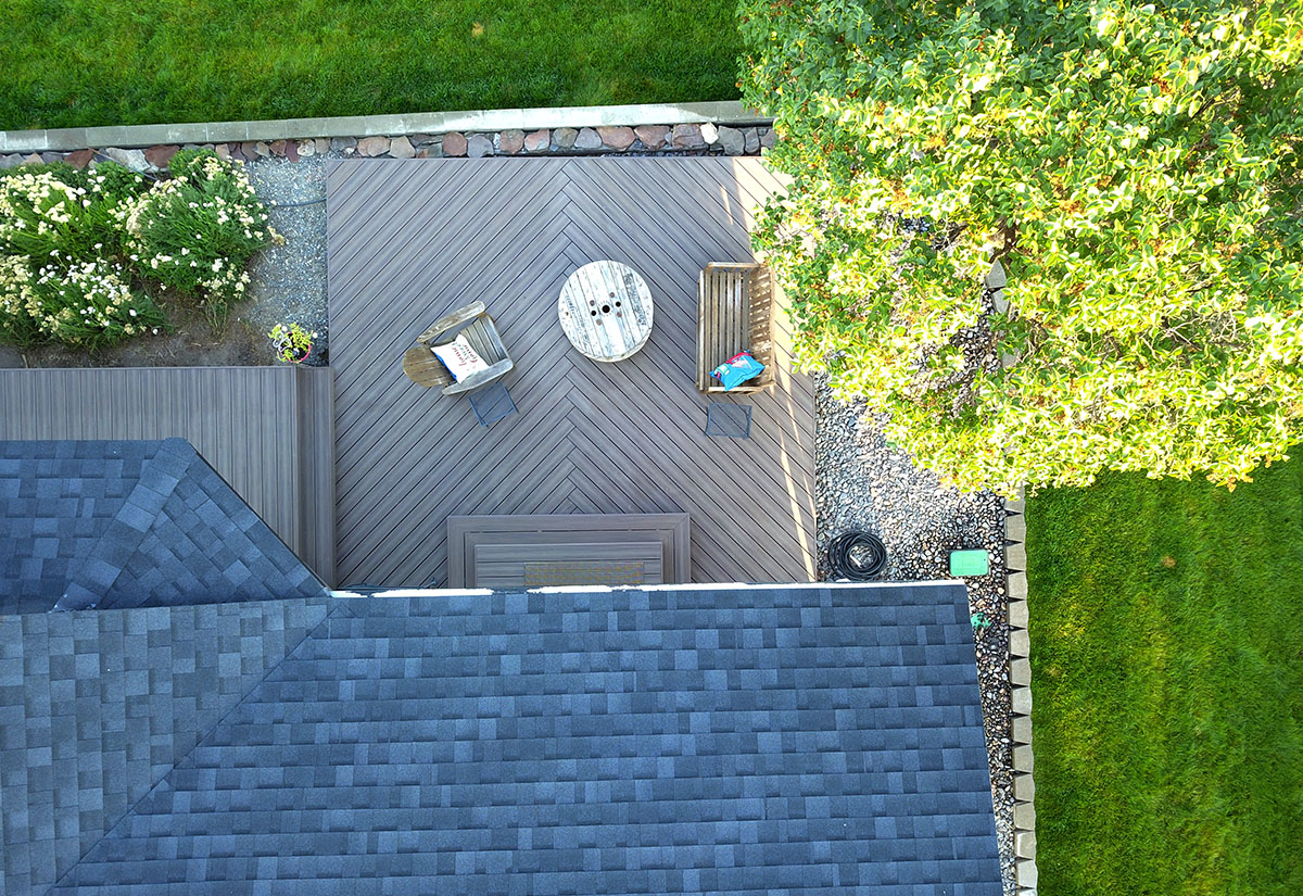 Deck resurfaced with new composite boards over a sound existing frame